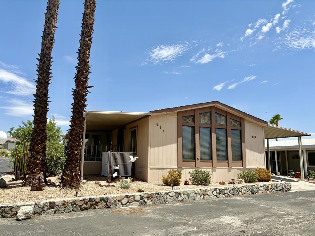 Welcome to Family Friendly Sky Valley Resort! A hidden GEM in the Desert! This home offers 2 Bedrooms & 2 Bathrooms and is situated on a Large Corner lot with SPECTACULAR PANORAMIC VIEWS!! When you walk through the front door there's a Spacious Living Area with Floor to Ceiling Windows to take in the View of the Greenbelt, Pond & Desert Mountains! Nice Formal Dining Area with Built In Hutch. The Large Kitchen has newer Stainless Steele appliances, lots of Cabinets & Pantry for ample storage! The Breakfast Bar can seat 4.. Both Bedrooms have large mirrored Closets & Ceiling Fans. The Primary Bathroom has a walk in Shower. There's a Large Laundry Room with Washer, Dryer, & extra Freezer. Enjoy taking in the breathtaking views from your spacious Sun Room or out on the front covered porch. There are 2 covered Carports for lots of parking. This property is being offered partially furnished! Golf cart is included in sale.The Main Clubhouse and Pools are close by! Sky Valley Resort is a Gated, Family Community. The Resort offers MANY Great Amenities including 13 Hot Mineral Pools & Spa's, Fitness Center, Sauna, Tennis Courts, Pickle Ball Courts, Horseshoes, Shuffleboard, Cafe, Chapel, & a Doggie Park. As a Resident you can Golf at the Sister Park, Caliente Springs, which is only a couple miles down the Road. The Property has Space Rent and is not on Leased or Fee Land. There is Space Rent of $1,275./mo. Short Term Rentals are Allowed with Restrictions.Come out and explore the Amazing Desert Lifestyle. Palm Springs & Palm Desert is just 15-20 minutes away! You can get Financing on this Property! Call for more details!