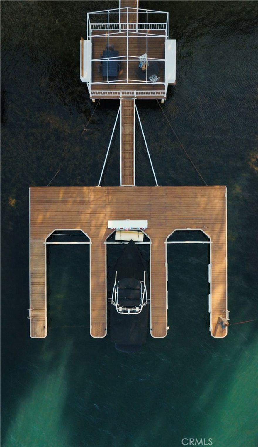 Highly Desirable North Bay Deep Water Dock with Covered Platform! This exceptional middle slip of a triple is perfectly positioned in Lake Arrowhead’s highly sought after North Bay. Set in the calm, no wake waters of this picturesque area, the deep water dock offers the ideal setting for boating, swimming, and relaxing on the water. The spacious covered platform and dock box provide plenty of room for entertaining or simply unwinding while taking in the serene lake views. A rare opportunity to own a premium dock in one of the most coveted and tranquil locations on the lake.