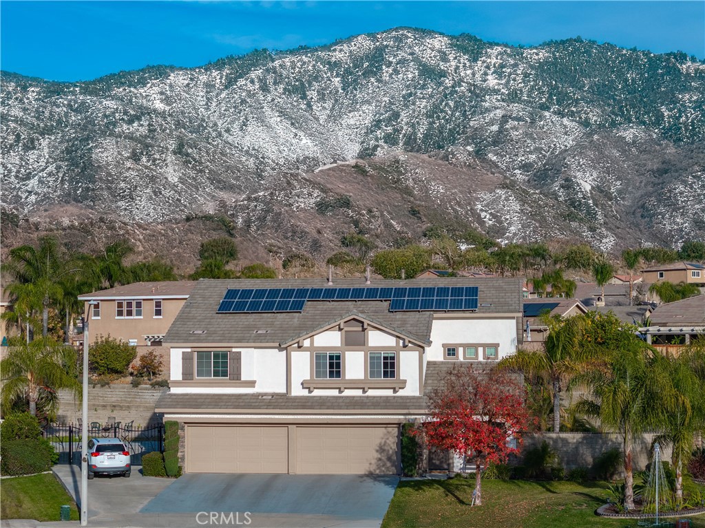 Attention All East Highlands Buyers & Agents! Wait Till You See This Amazing Updated Original Owner Home With Great Curb Appeal In The Highly Desired Ventana Development With Truly Special Mountain Views & FULLY OWNED SOLAR! Wonderfully Set On A Huge 19,237 SqFt Lot At The End Of A Cul De Sac! Fantastic Extra Wide Driveway That Leads To The Attached 4 Car Garage, Gated RV Parking! Two Brand New High Efficiency 4-Ton A/C Compressors & Heating System! Outstanding Open Floor Plan With Bedroom & Bath Downstairs! Gorgeous Granite Center Island (With Breakfast Bar) Cook’s Kitchen With Bullnose Corners, Stainless Steel Appliances & Lots Of Storage! Lovely Formal Living Room! Elegant Dining! Fabulous Family Room With Fireplace! Incredible “Super Loft" Which Could Easily Be Additional Bedrooms & More! Marvelous Main Bedroom Suite With Its Own Private Balcony, Retreat, Walk In Closet & Luxurious Bath! Terrific Room Sizes! Other Notable Features Include The FRESH Exterior Paint! Your Own Private 4 Car Attached Garage with Hanging Storage Racks! Entertainer’s Dream Yard With Fresh Landscaping, Sparkling Pool & Inviting Spa With Brand New Pool Filter, Water Valve & Regulator! Excellent Location! Close To Schools, Freeways, Shopping, Entertainment & Everything! This Home, Lot & Location Sells Itself! If You Are Only Seeing One Sensational East Highlands Pool Home In The Price Range, Make Sure 7905 Via Obra Ct Is It! Must See! Do Not Miss! East Highland Living At Its Best!