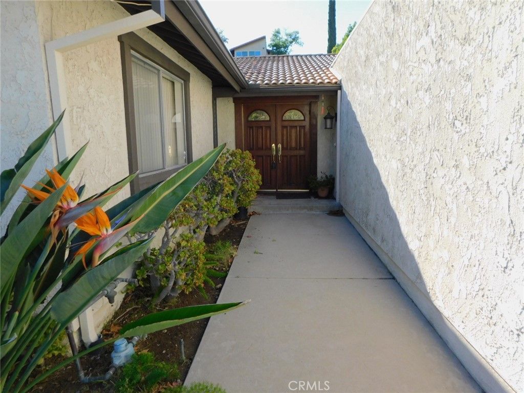 Photo of 12701 Norlina Pl, Granada Hills, CA 91344 (MLS # SR25238937)