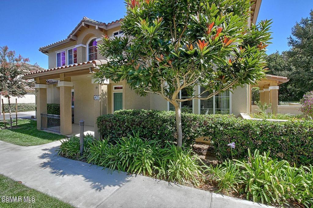 Gorgeous townhome in prime Newbury Park location! Welcome to this beautiful 3 bedroom, 2.5 bath townhome located in one of the best locations in the tract! Beautifully remodeled and move-in ready, this home offers an open and inviting floorpan filled with natural light from an abundance of windows.Kitchen has quartz counters, soft close cabinets, a full pantry with pull out drawers, stainless steel appliances including a refrigerator and brand new GE 5 burner stove. The spacious living room features a cozy fireplace, and an adjacent dining area. A convenient powder room is located on the first floor as well. Large primary suite has walk in closet and beautifully updated en-suite bath, complete with soaking tub. Two additional bedrooms with full bath. The upstairs laundry includes both washer and dryer. Large stamped concrete patio is perfect for entertaining and is surrounded by fruit trees and grapevines, with views of lush greenbelts. Other features include wood like flooring, dual pane windows, A/C, 2 car garage w/direct access. HOA includes trash, pool maintenance, and common area landscaping. Close to schools, shopping and recreation. Hurry, this one won't last!