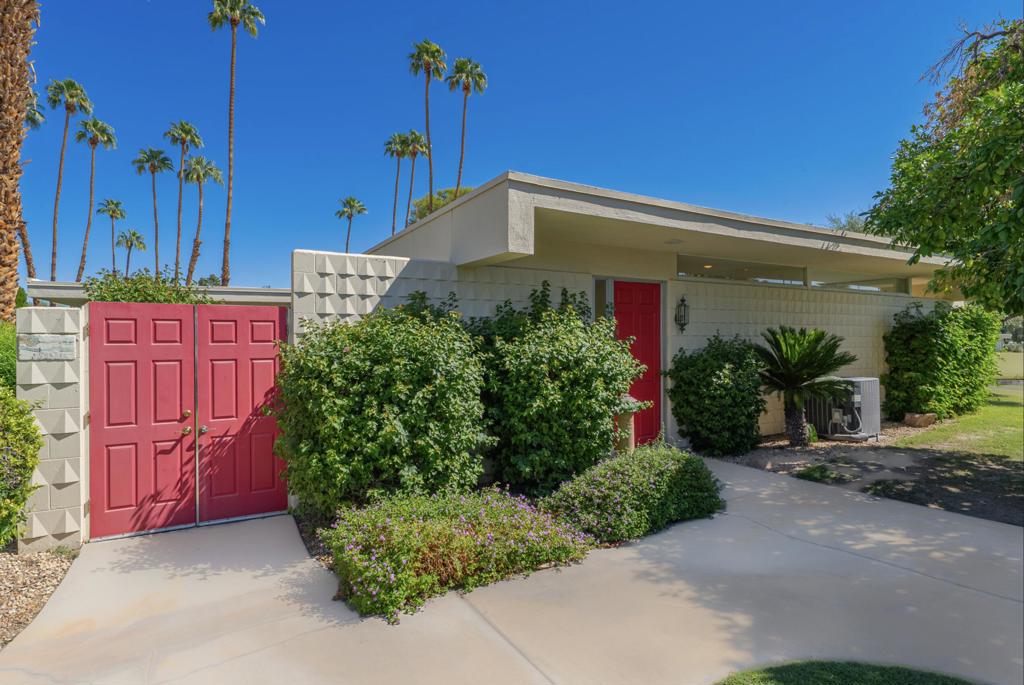 Located on the 18th green and overlooking the 7th Lake at the coveted Seven Lakes Country Club, all that's missing from this lovely 2bed/2bath home is your personal touch! This getaway is on a quiet cul-de-sac and was originally designed by Richard A. Harrison. Spread out over the 1,545 sq ft open floor plan, its spacious living room and dining area are ideal for entertaining or just taking in the desert's tranquility. Enjoy the best of Palm Springs' indoor/outdoor living with walls of glass sliders opening out onto a leisure terrace with double fairway views to the East. Or step through the Western window wall to a large courtyard, enclosed for maximum privacy, and its magical San Jacinto mountain vista. Both large bedrooms are tucked privately in back and offer great closets as well. This was a primary residence for over 10 years so has been lovingly maintained, including a newer HVAC system and an upcoming roof re-coating. An assigned garage is nearby while the tranquil pool is just steps away. Past the 24-hour guarded front gate, 'The Gem of the Desert' offers a unique elevated lifestyle with its Ted Robinson-designed 18-hole executive golf course, 15 pools and spas with poolhouses, tennis courts and the lively William Cody-designed clubhouse with a formal dining room, casual cocktail lounge, and a terrace overlooking the waterfall-fountain. Welcome home!