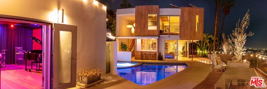 Step into an amazing opportunity! For the past 15 years this property, with its gorgeous 4 bed, 4 bath 1961 Mid Cent Modern house, pool, sauna and lovely grounds with breathtaking 180 views all on a gated private drive-has been the #1 luxury residential recording destination in So Cal.  Its world class recording studio has hosted the likes of Alicia Keys, Post Malone, Janelle Monae, J.Cole, Erykah Badu, TY Dolla $, T Pain, The 1975, The XX, Maneskin, Stiff Little Fingers, Machine Gun Kelly and so many more. We are now making the fully furnished house and grounds available to lease on a monthly basis. We are offering it without the studio for the posted amount.  We are also offering any musician, producer, composer, etc., who additionally wants to utilize the fully equipped, fully staffed studio during their stay to be able to do so for an added fee. Minimum house lease term 13 months. Please contact LA 2 Norm Kerner for all studio-related inquiries.