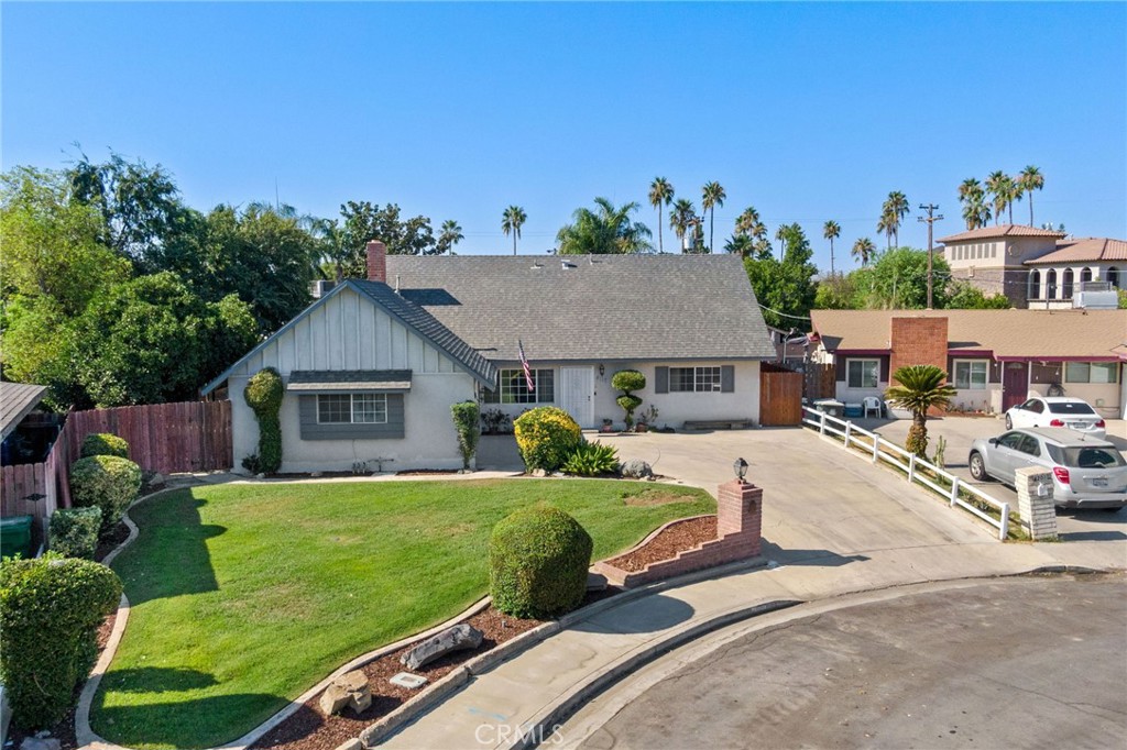 Step into your dream home on this peaceful SW Bakersfield cul-de-sac! This fabulous 4-bedroom, 1.75-bath gem offers space, charm, and comfort. Cozy up by the brick fireplace in the formal living room, or gather in the bright family room overlooking a serene, shade-filled side yardperfect for lazy summer afternoons. The spacious kitchen with pantry and dining area makes family meals a joy. Two bedrooms, including the inviting primary suite, are downstairs, while two oversized bedrooms and an updated bathroom await upstairs. Enjoy direct access to the large 2-car garage from the family room. Outside, entertain under the full-length covered patio, store everything in the large shed, or let the kids play in the adorable playhouse/potting shed.Tons of storage thru out interior and garage. Don't miss your chance to call this charming, move-in-ready home yours!