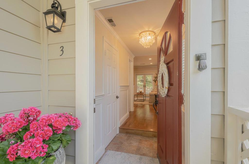 Located in the gated community of Glen Lakes with its picturesque lake, stream, and trees, this updated end unit was a prime lot when this development was built. Dual-pane windows, updated lighting, plantation shutters, updated kitchen and baths with new Quartz countertops make all the difference when choosing a move-in ready unit. This spacious 1,600 sq ft home offers two primary bedroom suites. If desired, the sitting room/office area of the junior primary suite was designed to be easily reconfigured into a 3rd bedroom - see the 2nd floor plan. Cozy up to the fireplace in the comfortable living room with views out the French doors to the oversized patio and green space. For your convenience, a washer and dryer are located in the attached two-car garage - right off of the kitchen. Outdoor enthusiasts will enjoy the tennis/pickle ball courts on site and the nearby park. Grocery stores, eateries, and a coffee shop are close by. The HOA covers the exterior including the roof and painting. Don't miss this chance to own in Pacific Grove and all it has to offer.