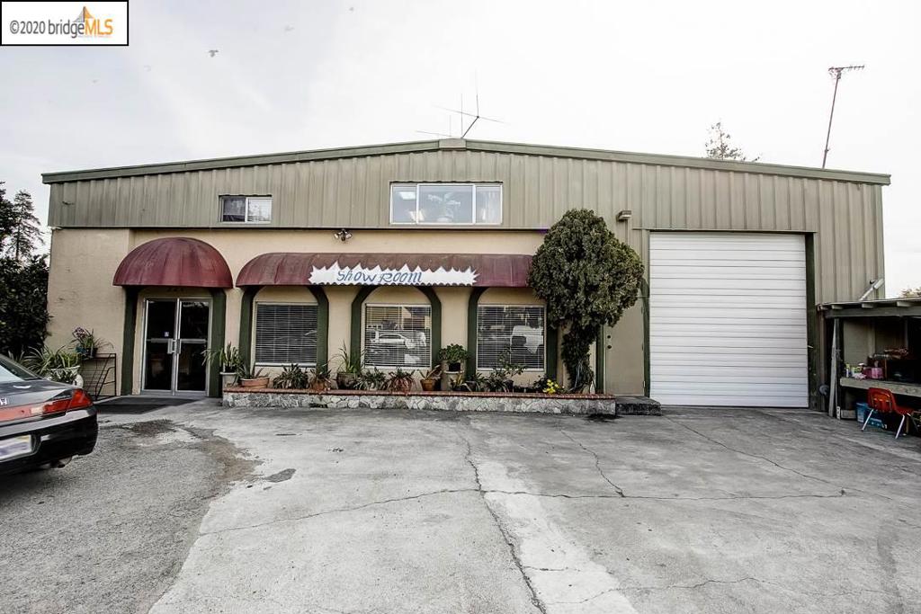 This building has been nicely maintained. Perfect for owner user or investment opportunity for development. Current owner has run a hardwood floor business for over 10 years. 5,220 s.f. showroom & warehouse with kitchen & 2 restrooms and an additional 1,500+/- sq.ft. condo style unit upstairs which is set up as 2 bedrooms, 1 bath, kitchen, laundry and office. Total lot size is apprx 13,388. Perfect for live/work. Front parking for 18 cars & trucks. Close to 880, 238 and 580.