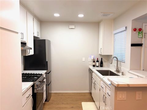 Photo of 7025 Glade Avenue #19, Canoga Park, CA 91303 (MLS # SR26085912)