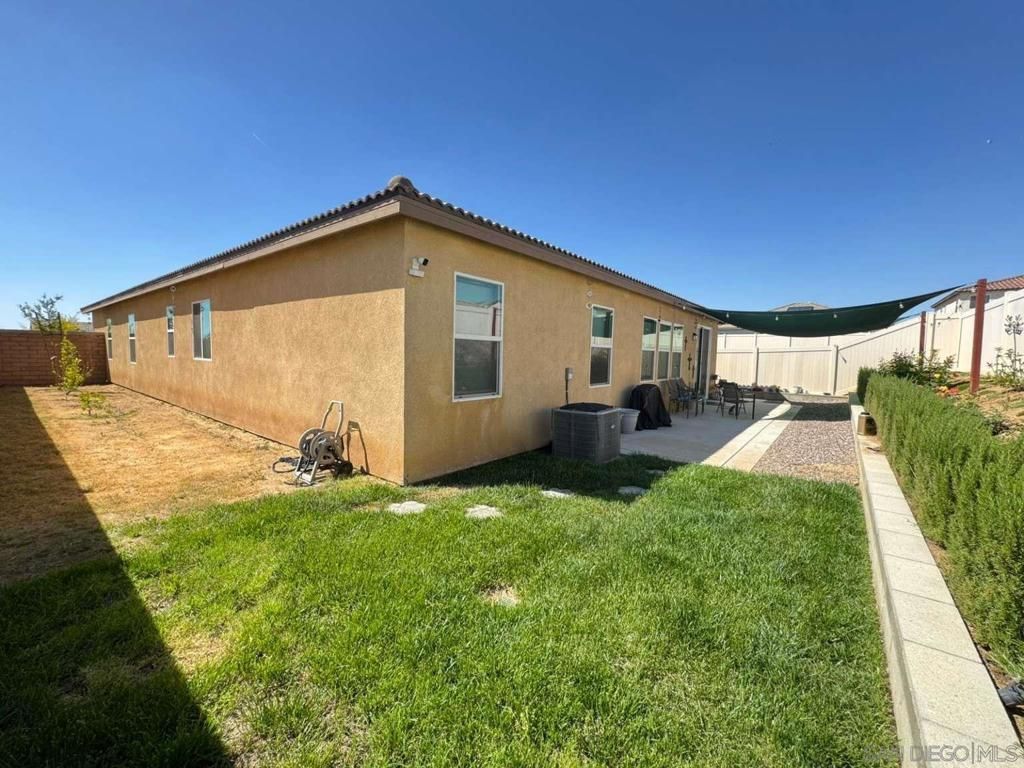 Photo of 25854 Buckeye Meadow Ln, Homeland, CA 92548 (MLS # 260008429SD)