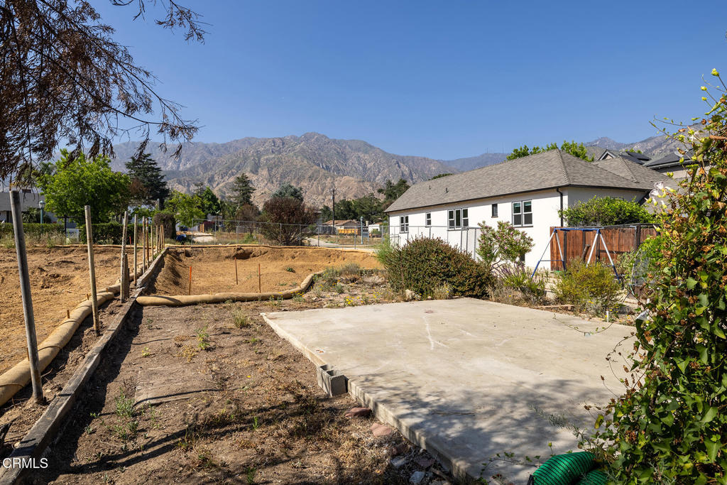 Rare development opportunity in a well-preserved East Altadena neighborhood with peaceful block-to-block streets, charming character homes, and mature trees. This large, flat, north-facing lot offers a unique chance to build your new dream home while embracing the timeless appeal of the surrounding area. The previous home included 1,440 square feet of living space, and the original detached two-car garage is still intact. According to current L.A. County guidelines, the new owner should be able to expand the footprint by up to 200 additional square feet and convert the existing garage into an ADU using existing setbacks through a fast-track approval process. The generous 7,224 square foot lot also provides the potential to build a significantly larger residence. (All of this information should be verified by the buyer with the LA County Building Department.) This is an exceptional opportunity to bring your vision to life in one of Altadena's most coveted and established neighborhoods.
