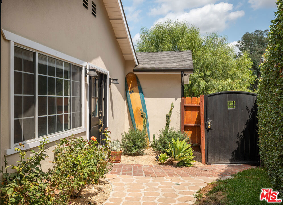 California charm meets modern convenience in this stunning home south of Ventura Boulevard in prime Woodland Hills. Nestled on a 6,272 sq. ft. lot, this newly updated residence offers an inviting, bright and airy open floor plan re-designed for comfort with style and practicality. Inside, you'll find 3 spacious bedrooms and 2 beautiful bathrooms, an ample kitchen with breakfast bar, a warm living/dining space with a cozy fireplace, flooded with natural light. Step outside to your private backyard retreat, complete with a sparkling pool, lush landscaping, perfect for entertaining or unwinding with tranquil canyon views. The 2-car attached garage adds everyday convenience. Located just minutes from premier shopping, dining, freeways, and award-winning schools, this compelling offering has it all and in an unbeatable location.