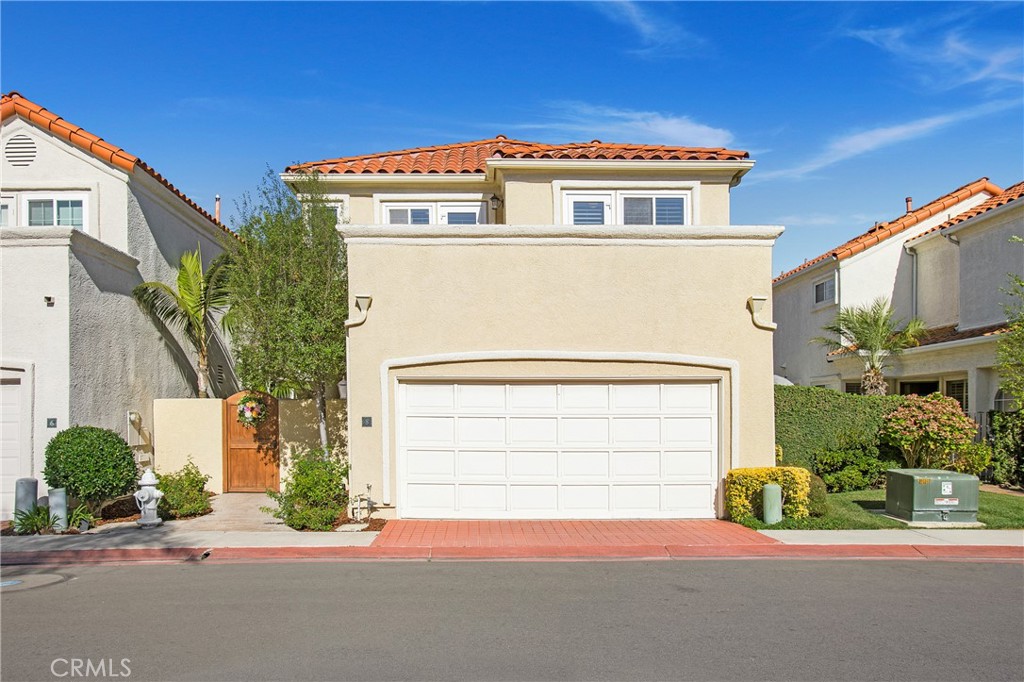 An exceptional opportunity to own the largest floor plan in "Antigua"—Plan C—in the prestigious, "Ocean Close", 24-hour Guard-Gated community of "Monarch Beach". This fully detached single-family residence offers 3 bedrooms, 2.5 bathrooms, plus an open loft/office area, perfect for today’s flexible living needs. Step inside to soaring vaulted ceilings, plantation shutters, and rich wood flooring throughout the main level. The inviting living and family room share a cozy fireplace, and the formal dining area is ideal for entertaining. The open staircase, 6-inch baseboards, and central air conditioning enhance the home’s spacious, upscale feel. The heart of the home is a gourmet kitchen featuring stainless steel appliances—new appliances this year include--double ovens, 4-burner range & Bosch dishwasher; enjoy a double stainless steel sink—plus an adjacent second family area and charming breakfast nook area. Upstairs, the primary suite offers vaulted ceilings, plantation shutters, private patio access, and an en-suite bathroom complete with dual vanities, oversized soaking tub, walk-in shower, TV, and walk-in closet with additional closets and built-in storage. Two secondary bedrooms also enjoy access to a shared outdoor balcony with peekaboo views of the Pacific Ocean. The home’s private rear and side yards create an ideal setting for outdoor entertaining with a custom fire pit, multiple lounge areas, and lush landscaping—an oasis of comfort and privacy. All new exterior landscape lighting in process. Other features include whole house Pex piping, tankless water heater, Aquasauna whole house water filtration system, 3 Toto toilets, custom tinted windows and upgraded doors, spacious main floor powder room, oversized finished two-car garage with epoxy flooring, custom cabinetry, overhead storage, and direct access, light and bright, open floor plan throughout. This incredible residence is just minutes from the Waldorf Astoria and Ritz-Carlton Resorts, Monarch Beach Tennis Club, the world-famous Salt Creek Beach and its famed surfing breaks as well as the Dana Point Harbor’s Lantern District, with boutique shopping, dining, and coastal recreation nearby. Enjoy the best of coastal living in a home that combines privacy, spaciousness, and sophistication. This is a rare opportunity to own an upgraded, detached home in one of Southern California’s most coveted coastal enclaves. Don’t miss it!