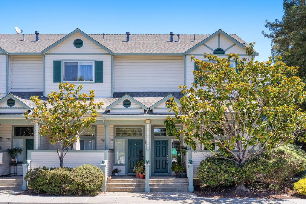 Live the Santa Cruz Lifestyle at 1720 Ocean Street. Where luxury meets coastal charm, this 3-bedroom, 2.5-bath townhouse blends style, comfort, and location in one perfect package. With instant access to both Highway 1 and Highway 17, your commute is a breeze whether you're headed to the coast or over the hill. You're just minutes from a variety of beaches and the Santa Cruz Beach Boardwalk. Savor local favorites just down the street in Santa Cruz on Pacific Street or at the beach, or stroll through the downtown boutiques, coffee shops, and galleries. Outdoor adventure more your style? Surf, kayak, hike, bike, or mountain bike, all minutes away. Step inside to soaring ceilings and a light-filled living room end unit where airy elegance meets everyday comfort. The open floor plan flows seamlessly to a raised dining area and a sleek granite kitchen with stainless steel appliances and a convenient guest half bath. Hardwoods, carpet, and beautiful countertops await. Upstairs, you'll find 3-bedrooms, each with generous closets, plus a laundry room right where you need it. The attached two-car garage provides parking ease and extra storage. Outside, beautifully landscaped grounds create a serene, low-maintenance backdrop for your coastal lifestyle.