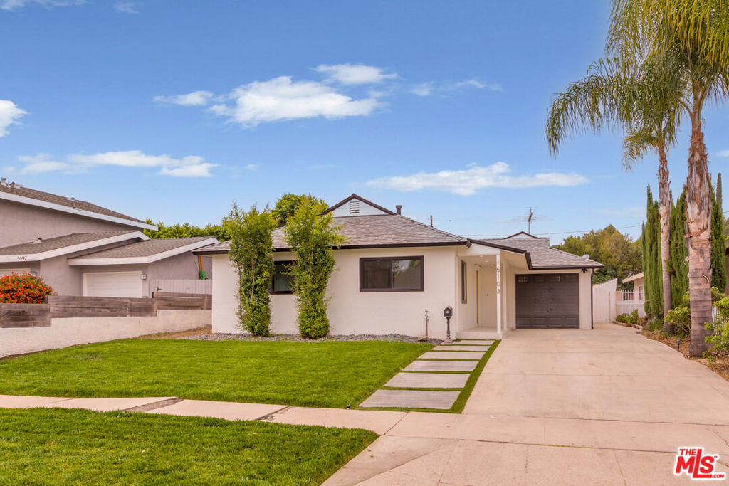 Discover this beautifully renovated single-family home nestled in the coveted Tarzana neighborhood south of Ventura Boulevard. Featuring 3 bedrooms and 2 bathrooms, this stylish contemporary residence boasts an open-concept layout filled with natural light and picturesque views of the backyard from all major living spaces. Enjoy the seamless indoor-outdoor flow from the spacious living and family rooms to a serene backyard retreat, complete with a large grassy area, sparkling pool, and built-in BBQ perfect for entertaining or relaxing in privacy. Set on a generous 7,100 sq ft lot, the home also offers excellent potential for expansion for a much larger home. Located just moments from trendy shops, acclaimed restaurants, top-rated schools, houses of worship, and with easy access to the 101 Freeway, this location offers both convenience and a high walkability score. This is a rare offering, easy to show and ready for the right buyer.