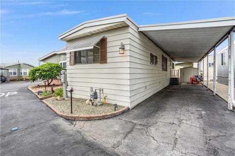 Photo of 840 Foothill Vista MHP BLVD #85, Azusa, CA 91702 (MLS # CV26210823)