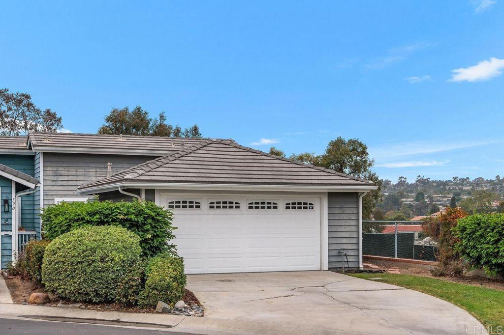 Charming, ideally located and close to everything! Yet....a secluded development that no one even knows about! This charming home is at the back of the complex tucked away from the hustle bustle. End unit, only one attached neighbor. It has long driveway for your guests to park plus lots of additional guest parking close as well. Remodeled with decorator choices galore! All the living area is on first, entry level. High volume ceilings with spacious living room/dining room combination. Cozy fireplace. Kitchen has abundance of storage, newer cabinetry, trend setting amenities. Two large bedrooms down plus an extra room that could be a great office or workout room. Large balcony off main living area to enjoy outdoor living with stairs that lead down to, yet another, patio and gardens.. The community offers resort lifestyle with pool, lots of garden/green belts and pickle ball/tennis. Its beach living that is close to downtown Encinitas, the beach, I-5, shopping but tucked away; best kept secret in Encinitas!