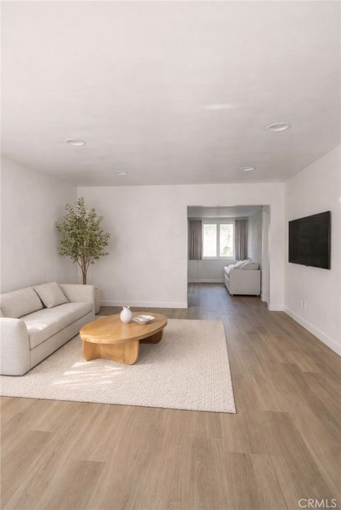 Photo of 11909 Lowemont Street, Norwalk, CA 90650 (MLS # PW25279206)