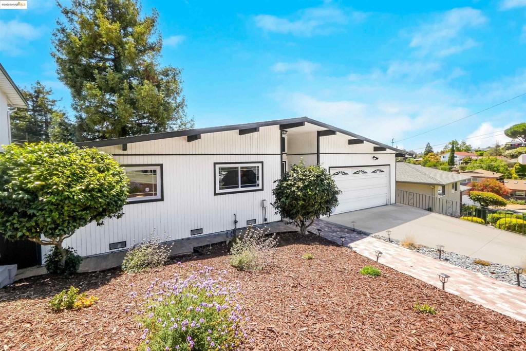 This Castro Valley mid-century gem blends warm bamboo floors, soaring wood-beamed ceilings, and a skylit chef’s kitchen into one irresistible package. Step onto the full-length deck for sweeping Bay views, or retreat to the private ADU with its own kitchen, living room, bedroom, bath, and laundry—perfect for guests or rental income. A backyard studio invites creativity, while the two-car garage and driveway add convenience. Just 1.5 miles from Castro Village, Philz/Peets/Starbucks coffee, the new Castro Valley Marketplace, dining, and shopping, with top-rated schools and easy BART, 580, and Silicon Valley shuttle access, this is Bay Area living at its best.