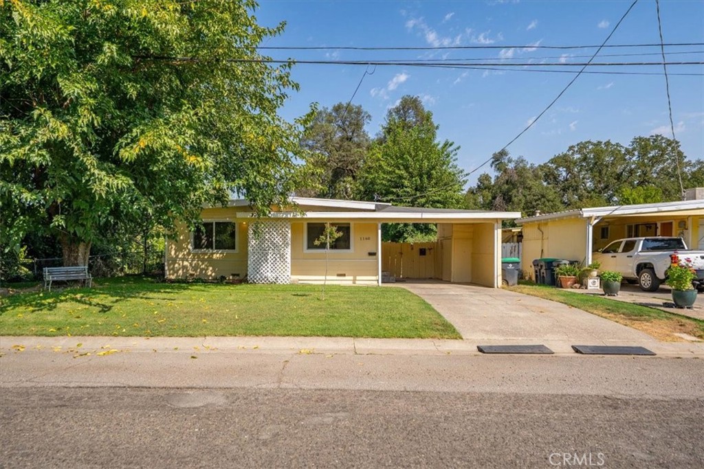 This charming home is clean and feels very spacious with vaulted open-beam ceilings throughout. The home has Luxury Vinyl Plank flooring, except for the bedrooms that feature carpet. The kitchen has recently been updated with new lighting, cabinets, countertops, sink, dishwasher, range and overhead microwave. The master bedroom is over sized and will accommodate large furniture. The 3rd bedroom has plenty of storage with built in drawers and closet. All the windows and the slider are dual pane; it also features Ductless Mini Splits for an energy effective way to heat and cool the home. It has a big fenced backyard with raised beds for gardening. There is a large portion of the 1.87 acres that slopes back to the creek behind. The home does not require flood insurance. If you are looking for your first home, investment home, or looking to down size, this is the perfect home for you.