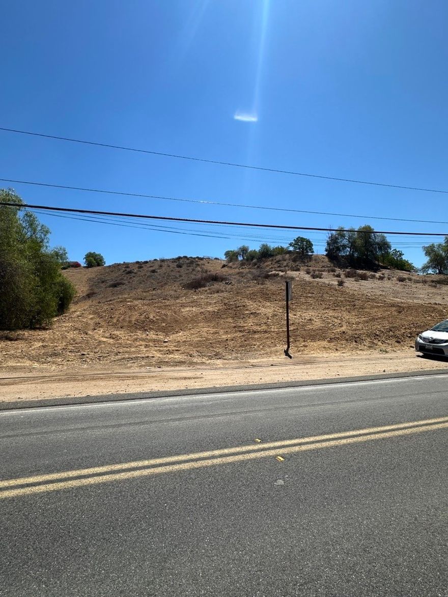 Prime opportunity to own 2.26 acres in Menifee’s Quail Valley Ranchos community! This parcel offers the ideal setting for a dream home, private retreat, or long-term investment. Power, water, and sewer are available in the surrounding area. Conveniently located off Goetz Road and just 13 minutes from Canyon Lake, this untouched land offers a rare chance to secure property in one of Riverside County’s fastest-growing regions. Moratorium has been lifted. allowing Septic Tank. Buyer to verify all zoning, utilities, setbacks, and development potential with the City of Menifee and the County of Riverside.