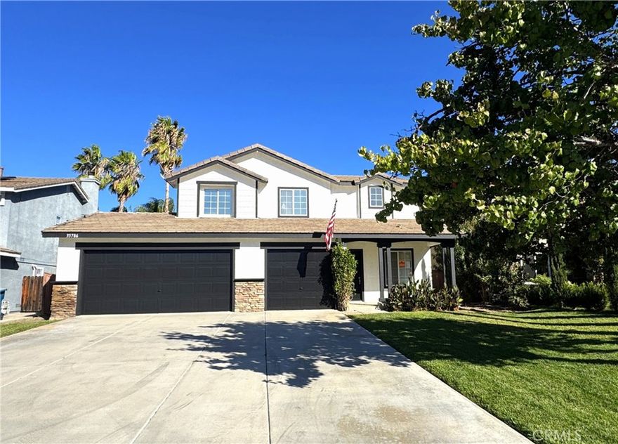 A newly renovated, two-story home awaits at 35786 Octopus Ln in Wildomar, CA, offering 3 bedrooms, 2.5 bathrooms, and a spacious layout for comfortable family living. The residence features a fresh look with new interior and exterior paint, complemented by new carpets and professionally cleaned tile throughout. Move-in ready The house is in pristine condition with fresh paint inside and out, new carpeting, and professionally cleaned tile flooring. The shower base has been reglazed and the air conditioning system has been recently serviced for a comfortable, stress-free move-in.

Spacious interior The main level includes a formal living room with a combination dining area, leading into a separate family room with a cozy fireplace. A versatile loft area upstairs is ideal for a media room, home office, or play space.

Modern kitchen The kitchen is equipped with newer-style cabinets, countertops, and appliances, making it a functional and stylish space for cooking and entertaining. Private master suite The upstairs master bedroom features a private master bathroom with a separate shower and tub, along with dual sinks for added convenience. Large backyard Step outside to a generously sized rear yard complete with a patio area, offering ample space for outdoor activities, relaxation, and entertaining guests.  3-car garage A three-car attached garage with a driveway provides plenty of parking and storage space. Indoor laundry The convenience of an indoor laundry area makes chores a breeze.

Wildomar community highlights Located in the welcoming community of Wildomar, this home offers easy access to amenities and activities. The area is known for its:  Outdoor recreation Enjoy nearby attractions like Lake Elsinore for water activities, or explore hiking trails and open spaces. Marna O'Brien Park also offers sports fields and picnic areas for the whole family. Family-friendly environment The city is known for its welcoming, family-friendly atmosphere and highly rated schools.

Convenient location Situated near Interstate 15, the home provides easy freeway access for commuting. Wildomar also offers a balance of tranquility with proximity to larger cities like Los Angeles and San Diego.