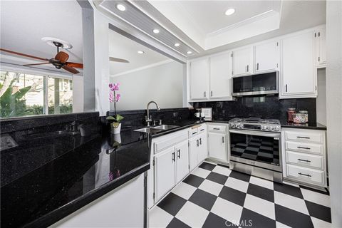 Photo of 7291 Coho Dr Dr #105, Huntington Beach, CA 92648 (MLS # OC26047294)