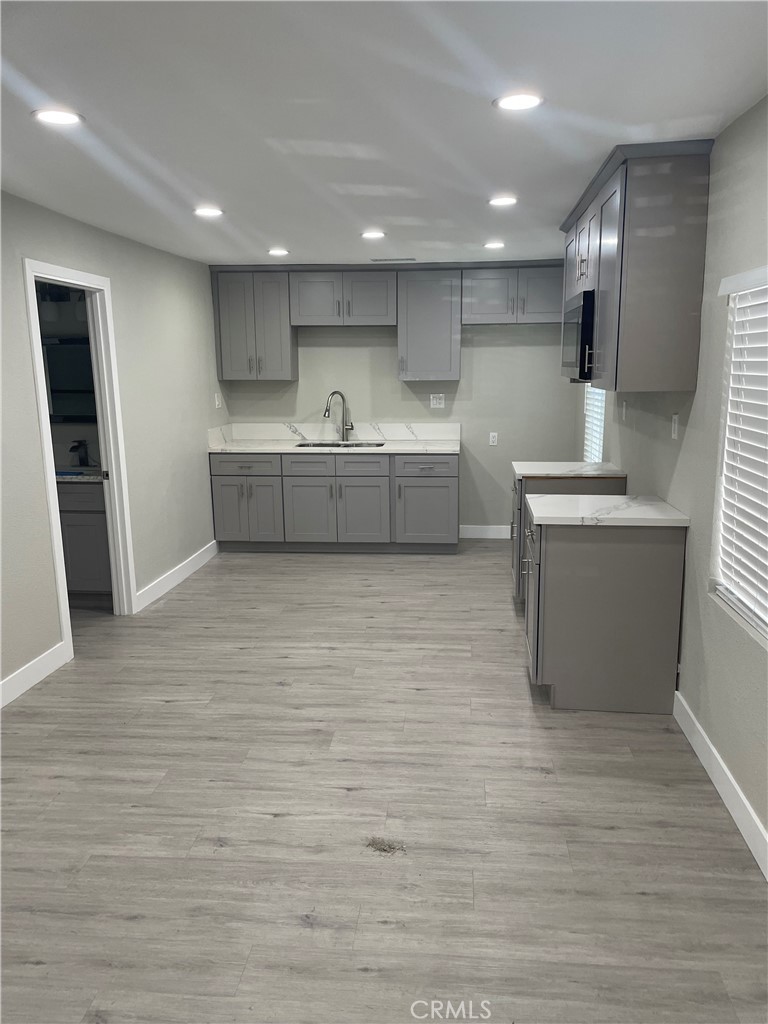 Freshly renovated 2br 2 ba, home with a huge master bedroom with its own beautiful bath, brand new windows, floors, kitchen, new central AC and Heat, washer/dryer hook ups, it has its own electrical and gas meter, open concept owner pays for water and trash, no garage but it has parking 3 regular size cars inside, gated on a cul-de-sac street