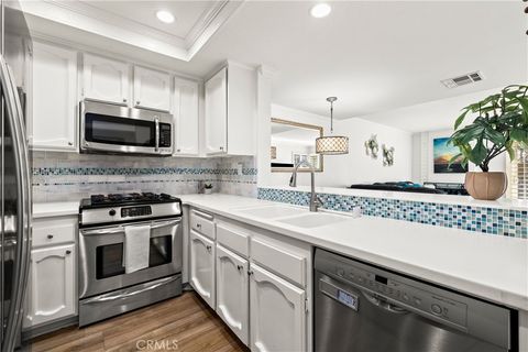 Photo of 5151 Walnut Unit#27 Ave, Irvine, CA 92604 (MLS # NP26006491)