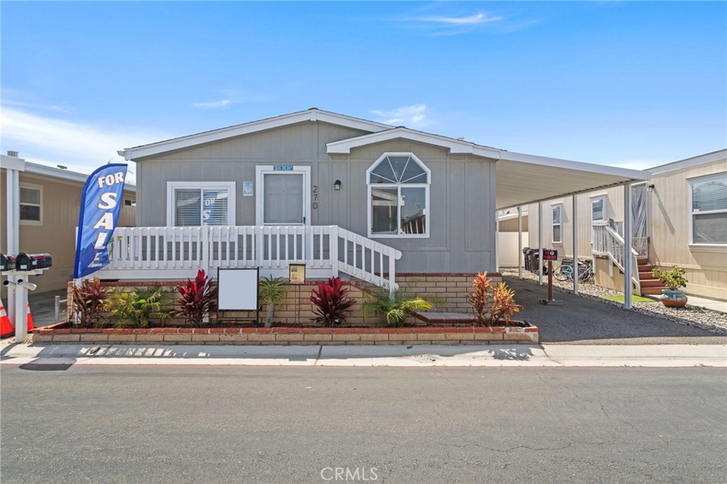 Discover unparalleled luxury living in this meticulously appointed 3-bedroom, 2-bathroom manufactured home, ideally situated within the prestigious gated community of Huntington Beach by the Sea, offering immediate proximity to California's renowned coastline while providing access to world-class resort amenities just minutes from Huntington Beach's pristine shoreline and iconic pier, with walking distance access to Surf City's premier shopping and dining establishments through a secure gated community entrance with controlled access and convenient carport accommodating multiple vehicles. This exceptional property features a thoughtfully designed open-concept floor plan maximizing natural light, showcasing a professional-grade galley kitchen with contemporary stainless steel appliance package, premium quartz countertops, extensive cabinetry and drawer storage solutions, and abundant natural lighting, complemented by luxury hardwood laminate flooring throughout, strategically positioned bedrooms ensuring optimal privacy, a spacious master suite with private en-suite bathroom, expansive windows creating bright airy living spaces, and a welcoming front porch ideal for enjoying ocean breezes. As a resident of this exclusive community, you'll enjoy unprecedented access to resort-style living amenities including private clubhouse facilities, year-round heated swimming pool and spa, fully equipped fitness center, recreation room featuring billiards, dedicated dog park for pet owners, and 24/7 gated security entrance, all accessible through a monthly community investment of $3,363.00 that provides comprehensive access to all premium amenities and community services, representing exceptional value for luxury coastal living. This turnkey residence represents a rare opportunity to secure a premium lifestyle property in one of Southern California's most desirable coastal communities, where the combination of recent upgrades, prime location, and extensive amenities creates exceptional value for discerning buyers seeking the ultimate in beachside luxury, with private showings available by appointment to experience this remarkable property and begin your journey toward sophisticated coastal living where luxury meets convenience and every day feels like a vacation.