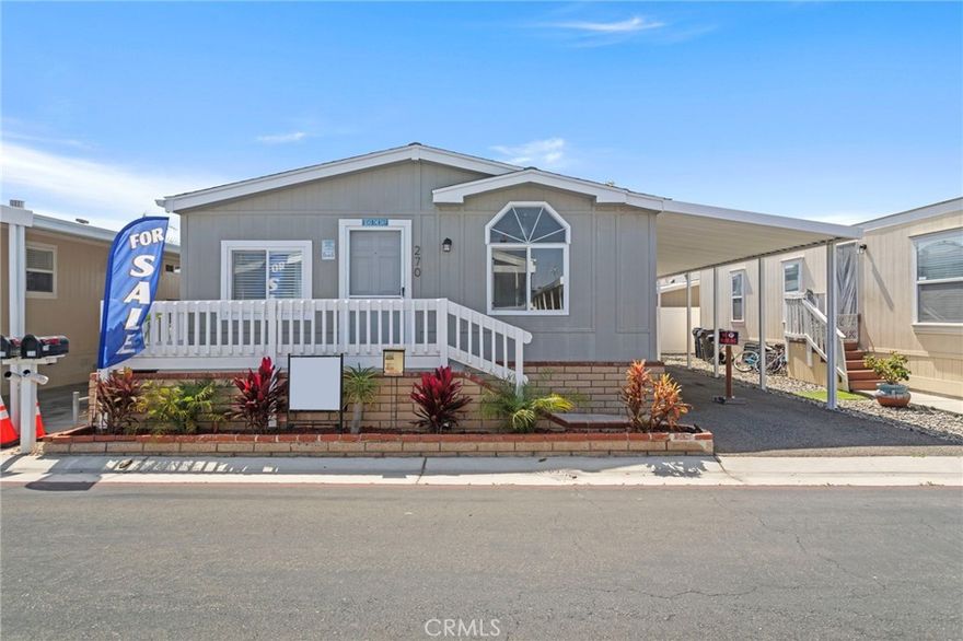 Discover unparalleled luxury living in this meticulously appointed 3-bedroom, 2-bathroom manufactured home, ideally situated within the prestigious gated community of Huntington Beach by the Sea, offering immediate proximity to California's renowned coastline while providing access to world-class resort amenities just minutes from Huntington Beach's pristine shoreline and iconic pier, with walking distance access to Surf City's premier shopping and dining establishments through a secure gated community entrance with controlled access and convenient carport accommodating multiple vehicles. This exceptional property features a thoughtfully designed open-concept floor plan maximizing natural light, showcasing a professional-grade galley kitchen with contemporary stainless steel appliance package, premium quartz countertops, extensive cabinetry and drawer storage solutions, and abundant natural lighting, complemented by luxury hardwood laminate flooring throughout, strategically positioned bedrooms ensuring optimal privacy, a spacious master suite with private en-suite bathroom, expansive windows creating bright airy living spaces, and a welcoming front porch ideal for enjoying ocean breezes. As a resident of this exclusive community, you'll enjoy unprecedented access to resort-style living amenities including private clubhouse facilities, year-round heated swimming pool and spa, fully equipped fitness center, recreation room featuring billiards, dedicated dog park for pet owners, and 24/7 gated security entrance, all accessible through a monthly community investment of $3,363.00 that provides comprehensive access to all premium amenities and community services, representing exceptional value for luxury coastal living. This turnkey residence represents a rare opportunity to secure a premium lifestyle property in one of Southern California's most desirable coastal communities, where the combination of recent upgrades, prime location, and extensive amenities creates exceptional value for discerning buyers seeking the ultimate in beachside luxury, with private showings available by appointment to experience this remarkable property and begin your journey toward sophisticated coastal living where luxury meets convenience and every day feels like a vacation.