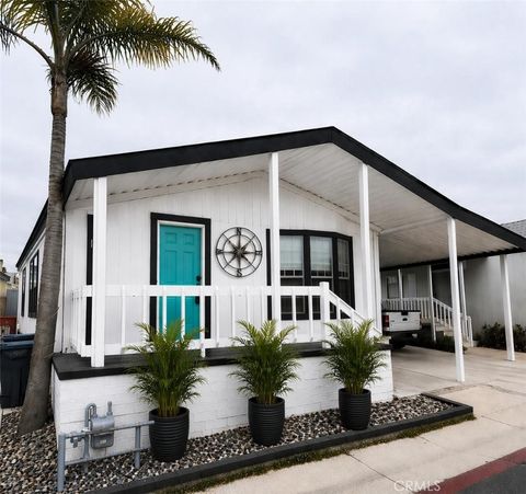 Photo of 21851 Newland Street #204, Huntington Beach, CA 92646 (MLS # OC26083351)