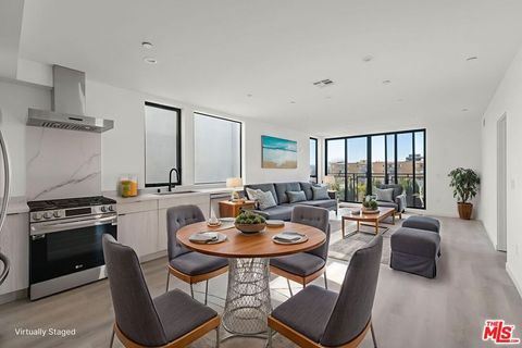 Photo of 3755 S Canfield Avenue #302, Los Angeles, CA 90034 (MLS # 26668623)