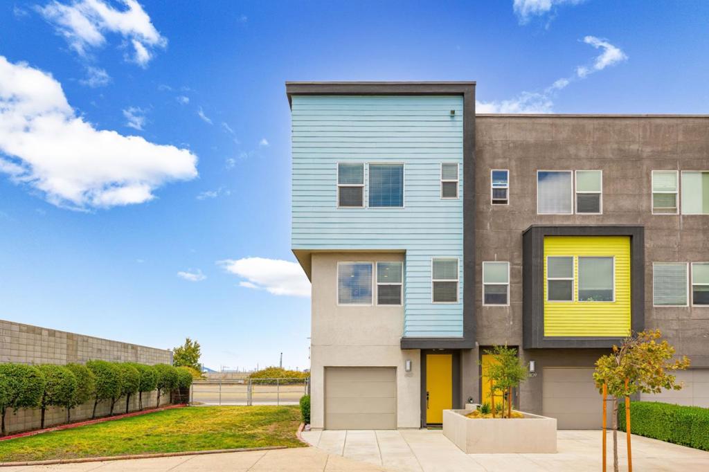 Built in 2020, this like-new tri-level end-unit townhome offers 1,844 sq ft of bright, airy living space designed for comfort, style, and energy efficiency. The bright open-concept floor plan is enhanced by double-pane windows, recessed lighting, and AC for year-round comfort. Upon entry, the downstairs bedroom is ideal for guests, home office or a second living room with access to the yard. The second floor features a sleek, modern kitchen that boasts Bertazzoni stainless steel appliances and a kitchen island, perfect for cooking and entertaining. On the third-floor landing, you can find the in-unit washer & dryer between two primary suites, each with private ensuite baths, providing flexibility and privacy. Home comes equipped with solar panels and smart home features, including Nest thermostat, Nest Guard alarm with Nest doorbell and Google Detect sensors on the front and back doors. A Nest security camera overlooks the backyard for peace of mind. Enjoy your private backyard for outdoor gatherings, attached 1-car garage, plus an additional uncovered parking space. Located minutes from SF, ensuring quick access to dining, shopping, and commuter routes like BART (7 minutes to DT SF), freeway access and transportation. This home is move-in ready and waiting for you!