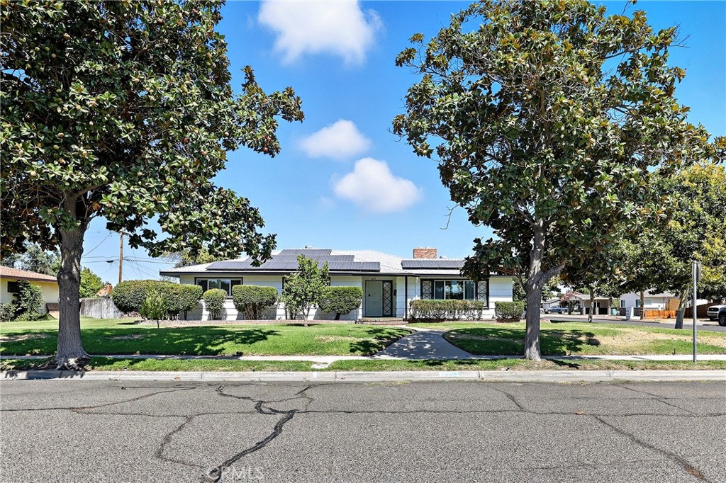 Welcome to 1505 Redwood Ave, located in the highly sought-after Elmer Wood Elementary School District. This beautifully updated home sits on a spacious 13,521 sq. ft. lot, perfect for entertaining and relaxing. The backyard is a true retreat with an inground pool (replastered in 2018 with a new pump), a covered wood patio, and plenty of space for summer BBQs. RV owners will appreciate the extended driveway with custom automatic wrought iron gates, while a charming barn-style storage shed offers additional space with potential for an ADU conversion. Inside, this home shines with fresh interior and exterior paint, new dual-pane windows, new carpet, and new laminate flooring throughout. The paid-off solar system adds modern efficiency and savings. The kitchen got a new look with custom painted cabinets, granite counters and upgraded appliances. You will enjoy cozying up the double-sided fireplace, spacious bedrooms and family room. The two-car garage is oversized with plenty of space for tinkering and additional storage. All of this, set in an established and desirable Atwater neighborhood, makes this property truly special!
