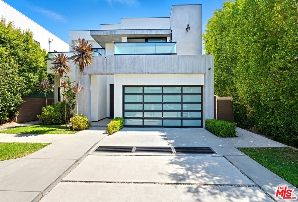Step into a sanctuary of refined elegance and elevated comfort, ideally situated in the vibrant heart of the city. This architectural masterpiece boasts 4 impeccably appointed bedrooms, 5 inspired bathrooms, and an exquisite blend of contemporary sophistication and timeless design.An expansive open-concept layout seamlessly unites the state-of-the-art chef's kitchen with the inviting living spaces, creating a light-filled ambiance ideal for both intimate gatherings and grand-scale entertaining. Disappearing glass pocket doors dissolve the boundaries between indoors and out, unveiling a private resort-style oasis.The meticulously landscaped backyard is an entertainer's dream, featuring a shimmering pool and spa, a sleek outdoor kitchen, and a covered patio designed for alfresco dining beneath the stars. A custom-built garage gym completes the space, offering the pinnacle of wellness and convenience.The gourmet kitchen is a culinary enthusiast's dream, equipped with top-of-the-line designer appliancesincluding a built-in oven and integrated espresso systemelevating every meal into a gourmet experience.This fully automated smart home is powered by a cutting-edge Control4 AV system, providing seamless command of security, sound, lighting, and ambianceall from the palm of your hand via iPhone integration. Energy efficiency meets luxury with paid-off solar panels, offering both sustainability and savings.Adding to its appeal, the home carries a short-term rental permit, presenting an incredible income-generating opportunity for potential buyers. Whether you plan to maximize returns by hosting guests or prefer to enjoy the home yourself and rent it out while on vacation, this property offers remarkable flexibility and value.The thoughtfully designed layout includes a versatile main-level bedroom or executive office, while the upper level offers lavish guest accommodations and a flexible bonus loft perfect for work, play, or relaxation.The primary suite is a haven of indulgence, featuring a palatial walk-in closet and a spa-like ensuite bath with premium finishes, soaking tub, and a sense of serene opulence.Located mere moments from premier shopping, acclaimed restaurants, and the iconic Grove, this exceptional residence offers the perfect fusion of luxury, lifestyle, and location.Experience unparalleled sophisticationyour dream home awaits.