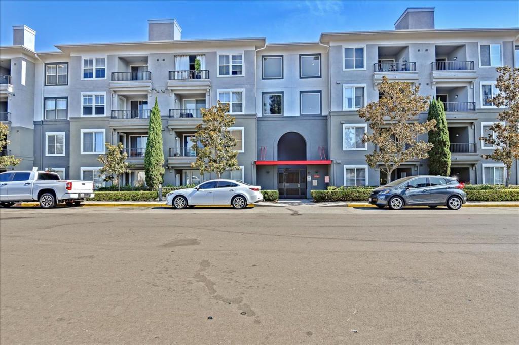 This 2-bedroom Stadium Lofts home in the coveted Platinum Triangle area is ready to be loved! This end unit with a courtyard view is a true entertainers dream - come home to a spacious open floor plan, multiple oversized windows that bring in abundant natural light, and gorgeous engineered hardwood floors! Relax indoors with recessed lighting and central air conditioning setting the mood right, or slide the glass doors open and enjoy al fresco lounging! Your new home is in a premier location that allows you to enjoy world-class amenities on-site! Resort-style pool, courtyard lined with beautiful palm trees, sun deck, and poolside fireplace are perfect for unwinding. Outdoor cooking areas, fitness center, and a sauna are also available. Near Angel Stadium, Disneyland, Honda Center, and tons of restaurants and shops. Conveniently close to all major freeways 5,57, 91, and 22.