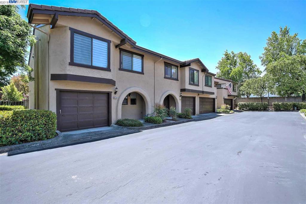 Beautifully updated Mission Glen Condo. Offering 2 bedrooms and 2 1/2 bathrooms, both bedrooms have an ensuite bathroom. Rare and spacious floor plan, 1,380 sq. ft., brand new laminate floors, stainless steel appliances, in-unit washer and dryer, central A/C, fireplace, cathedral ceiling, large kitchen, breakfast bar, quartz countertops, private outdoor terrace, community pool, attached one car garage and one assigned car space. Low HOA dues ($325/month). This condo features two stories and has a townhome feel. Must see! Easy access to highways 84, 238 and 680. Minutes from BART, Lake Elizabeth, shops and restaurants. Open House Jun. 16th & 17th (12:00pm-3:00pm).