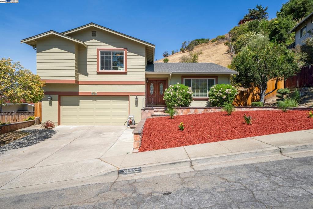 Experience the perfect blend of privacy, tranquility, and breathtaking bay views in this stunning split-level home. Offering 3 bedrooms, 2.5 baths, and 1,808 sq. ft. of thoughtfully designed living space, this residence is a rare find in a coveted location. Step through elegant double doors into a spacious living room with soaring ceilings, flowing seamlessly into the adjacent dining area—an ideal setting for gatherings. The renovated kitchen features stainless steel appliances, sleek modern finishes, and abundant workspace for your culinary creations. On the lower level, a cozy theater room with a pull-down screen sets the stage for movie nights, complemented by a convenient half bath and laundry room. Upstairs, two bright bedrooms share a well-appointed hall bath, while the luxurious primary suite boasts an updated bathroom for a true retreat experience. The backyard offers a deck to enjoy sweeping bay views—perfect for entertaining or quiet moments. Additional highlights include fully paid-off solar panels and luxury vinyl flooring throughout. Enjoy easy access to neighborhood parks, hiking trails, Cal State East Bay, Stonebrae Country Club, BART stations, and commuter routes to San Francisco and Silicon Valley.