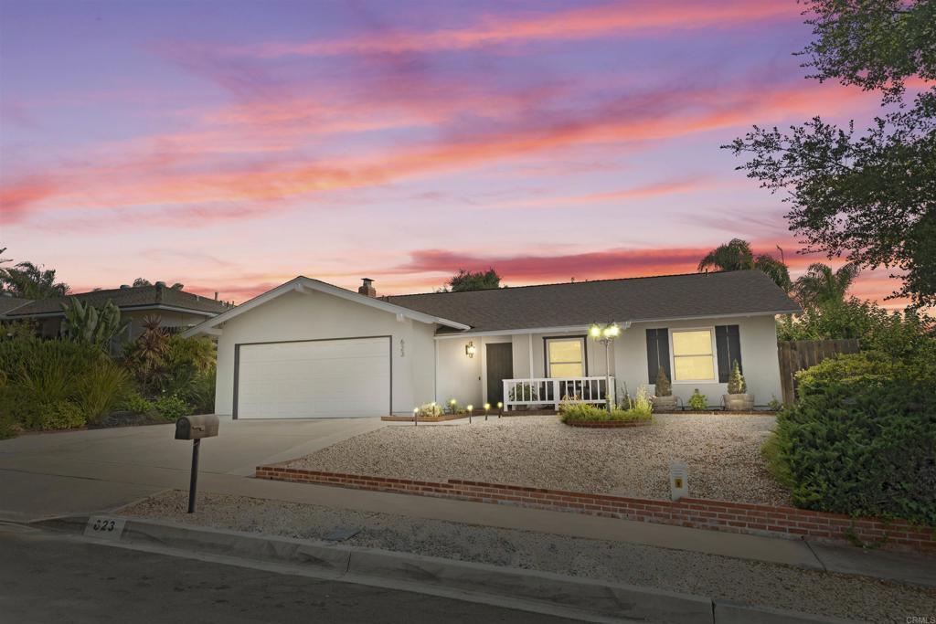 Step into the future of sustainable living in this beautifully updated Escondido home, where modern comfort meets energy-conscious design. A newly installed, fully paid solar panel system leads the way in efficiency, helping you reduce monthly costs while embracing an eco-friendly lifestyle. The home’s fresh exterior paint sets the stage for the thoughtful upgrades inside. You'll find new flooring throughout, elegant window treatments, and upgraded lighting and ceiling fans that create a calm, stylish ambiance. Granite countertops add timeless function and flair to the kitchen, while the 2021 AC and furnace, new garage insulation, and a newer roof (2019) ensure comfort and peace of mind year-round. Outside, this residence offers not only curb appeal but also location appeal tucked into a vibrant, highly convenient pocket of Escondido. Just minutes away are top-rated grocery options like Trader Joe’s, Sprouts, Vons, ALDI, and local gems like Vallarta and Major Market. Families will love the nearby Kit Carson Park, a local favorite with sports fields, playgrounds, and walking trails. For a bit of nature, Dixon Lake offers fishing, boating, and panoramic views, while nearby El Norte and Rod McLeod Parks add even more green space to your daily routine. Retail and entertainment are never far with North County Mall and the charming downtown Farmers Market just a short drive away. With a perfect blend of comfort, sustainability, and community, this home is a rare opportunity to enjoy modern living in one of Escondido’s most connected neighborhoods.