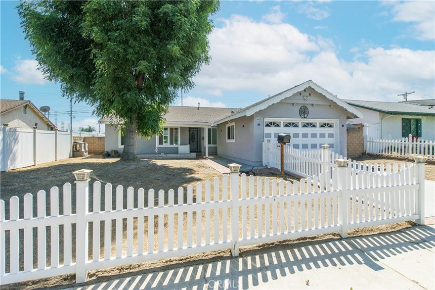 Welcome to this charming home nestled in the highly desirable North of Rinaldi neighborhood of Granada Hills. Tucked away on a peaceful cul-de-sac, this residence greets you with a classic white picket fence and an inviting front porch that sets the tone for the warmth inside.

Step into a light-filled, open-concept floor plan designed for both comfort and functionality. The remodeled kitchen showcases granite countertops, stainless steel appliances, and soft-close cabinetry, with a convenient laundry room just off the kitchen. Both bathrooms have been tastefully updated, complementing the home’s modern style. Three generously sized bedrooms provide the comfort and flexibility you’re looking for. The low-maintenance backyard features a covered patio and spacious side yards, creating the perfect setting for outdoor entertaining or relaxation. Additional highlights include newer dual-pane windows and sliding glass door, updated flooring, crown molding, recessed lighting, smooth ceilings, durable vinyl fencing, and more. This home blends timeless charm with thoughtful upgrades—ready for you to move right in and enjoy.