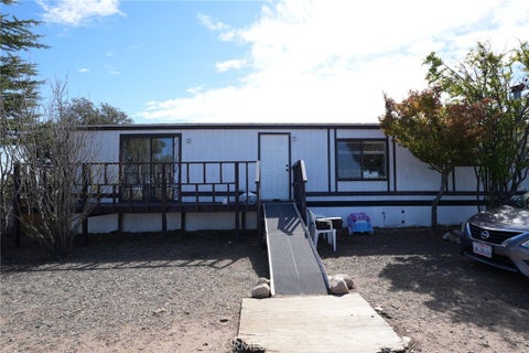 Photo of 10960 Duxbury Road Rd, Oak Hills, CA 92344 (MLS # HD26226224)
