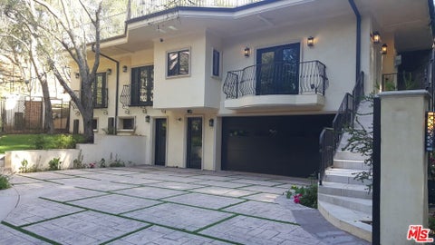 Photo of 1020 MORAGA Drive, Los Angeles, CA 90049 (MLS # 26893381)