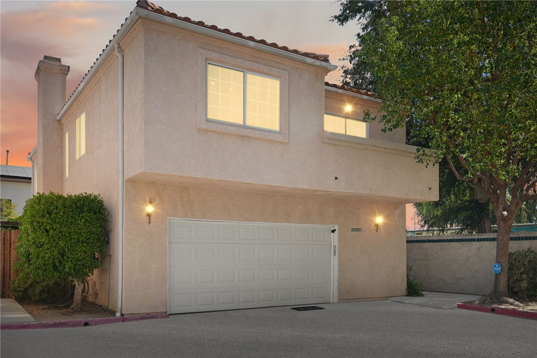 WOW! Discover this spacious and thoughtfully designed North Hills home with four bedrooms and three baths, in addition, the rare convenience of a main-floor bedroom/bonus room and bath—perfect for guests, multi-generational living, or a private office retreat. Ideally situated on a desirable corner lot with yard space on three sides, the property offers added privacy, mature fruit trees, and multiple outdoor areas for entertaining, complete with covered patios, awnings, and an above-ground spa, as well as a seamless flow from the dining area to the backyard for convenient entertaining. Inside, soaring two-story ceilings frame a dramatic living room anchored by a cozy fireplace, while the updated kitchen boasts newer cabinetry, countertops, backsplash, a breakfast bar, and a charming garden bay window above the sink. Upstairs, the oversized primary suite provides a seating area, private balcony retreat, walk-in closet, and spa-inspired en-suite with double sinks, soaking tub, and separate shower, complemented by three additional bedrooms—two with access to a shared balcony—and a beautifully finished full guest bath. The attached two-car garage enhances everyday living with an overhead storage lift, large utility alcove, butler’s sink, full-size washer and dryer, spare refrigerator, and abundant storage space, while modern touches like a Nest system add comfort and efficiency. Wonderfully located near shopping, dining, parks, the 405 freeway, and right next to an elementary school. This home offers the perfect blend of practicality, privacy, and timeless comfort. Don’t let this one pass you by!