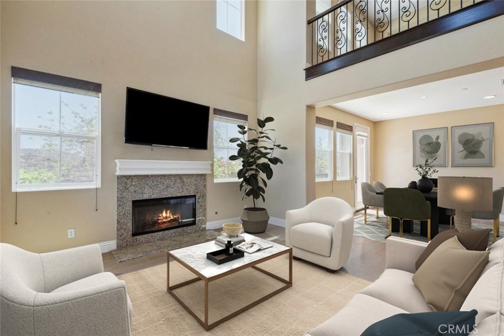 Great opportunity to own an Executive Home in this exclusive community where only 22 homes were built. This home offers the style and panache you look for in an entertainer's home. A downstairs bedroom makes it ideal to have family or guests stay over without altering the privacy of the homeowners. The vaulted ceilings add a look of sophistication and space when first walking into the home - followed by the huge get together area comprised of Family Room, Breakfast Nook and Kitchen dominated by a massive island. There are three fireplaces to enjoy during the chilly nights of the Winterseason. Enjoy the proximity of shopping, dining and freeways while preserving the quiet and serene setting of this community. Don't wait and call to schedule a private tour.