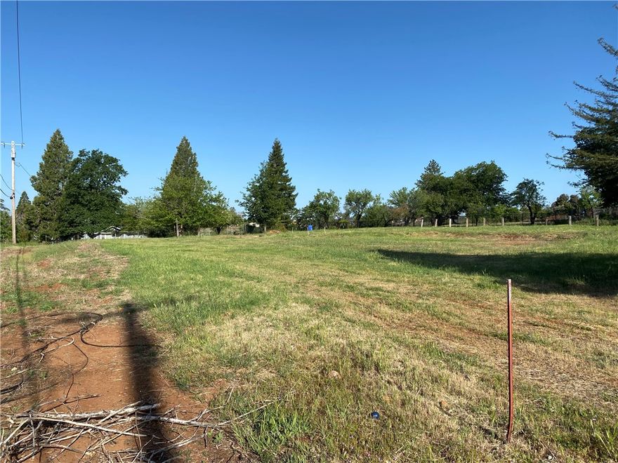 Peaceful .95-Acre Lot with Sweeping Mountain Views & Approved Plans – Ready to Build!

Welcome to your own slice of Paradise! This nearly 1-acre parcel offers approved house plans for a spacious 2,100 sq. ft. 3-bedroom, 2-bathroom home, making it the perfect opportunity to bring your dream home to life.

Tucked away at the end of a quiet lane, the property provides a peaceful country setting with stunning views of the coastal mountain range, all while being just minutes from town conveniences and an easy commute to Chico and Oroville.

The land is fairly level, nicely usable, and already improved with essential utilities including a Paradise Irrigation District (PID) water connection, a brand-new septic system with tank and leach field, and site history of a prior 3-bedroom, 2-bath residence.

Outdoor enthusiasts will love the endless recreation options nearby—from hiking, biking, fishing, and boating to ATV and dirt-bike trails, canoeing, and kayaking.

Whether you’re looking to build a permanent residence, a weekend retreat, or an investment property, this land checks all the boxes. Don’t miss this rare opportunity to enjoy both seclusion and convenience in one of Northern California’s most beautiful settings.