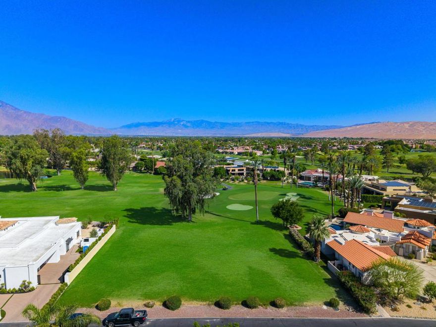 Spectacular Over 1/2 Acre Lot in Coveted Fairway Estates with Arnold Palmer Golf Course, Lake and Mountain Views. Overlooking multiple fairways of the Arnold Palmer Course and the #11 Green.   Room to build your own estate on one of the few remaining lots in Fairway Estates.