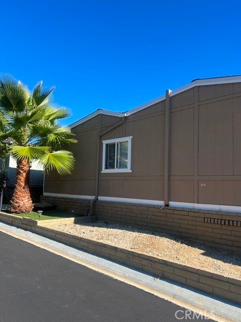 Photo of 24425 Woolsey Canyon Rd #152 RD, West Hills, CA 91304 (MLS # SR26230438)