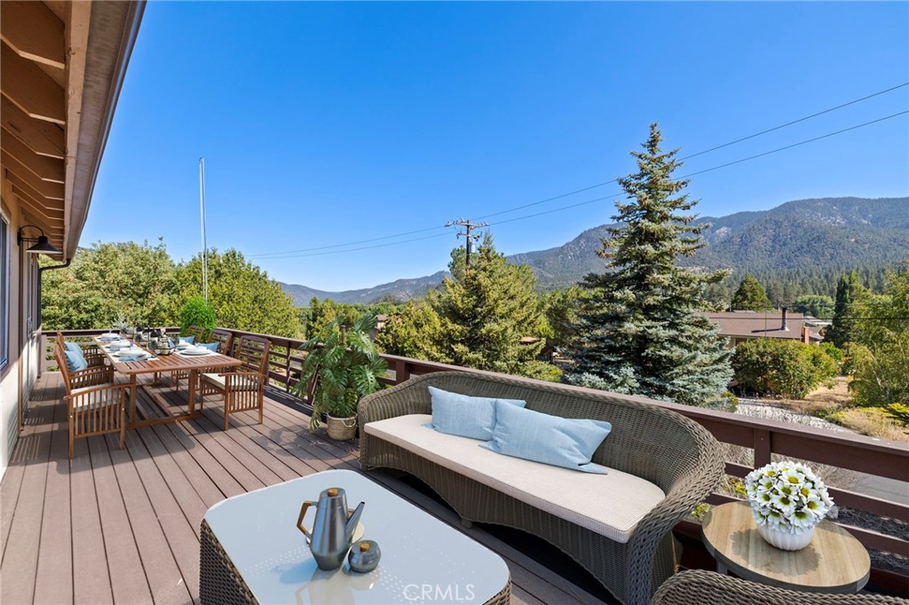 Discover mountain living at its finest in this spacious 2B/ 3B home offering 2,512 sqft. located in Pine Mountain Club. Experience a lifestyle filled with endless activities! Enjoy private hiking trails & campgrounds, golf course, community pool, ballpark, security patrol 24/7, year-round events like summer movie nights & live music on the greens. The clubhouse features a café & restaurant plus countless community clubs; this neighborhood truly has something for everyone! Inside this home you will enjoy mountain views from multiple vantage points, the wood beamed ceilings add warmth and character, while the primary suite located downstairs offers a striking walk-in shower surrounded by custom tile creating a relaxing retreat. The upstairs loft offers a versatile space with its own bdrm and bath perfect for guests, a private office or a cozy getaway within the home. This mountain retreat blends mountain charm with modern convenience, making it the perfect year-round residence or getaway.