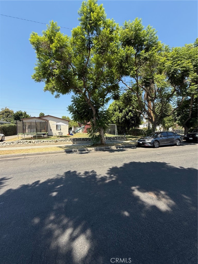 Investment Opportunity on this great location that is close to shopping, transportation, restaurants, & the 710 Fwy, etc. 4 units on a large 12,590 sqft lot consisting of 2 Single family houses and a duplex. 3 one bed, one bath units and a 2 bed one bath house. There is off street covered carport parking from the front and additional parking in the rear coming in from the alley. Roofs have been recently redone as well as some exterior & interior painting. Extra large lot all around the front house with room to move around for the tenants.