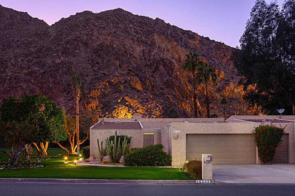 If you want a home with outstanding mountain views, this end-unit condo is one-of-a-kind. Situated on the 12th hole of one of two 18-hole golf courses in gated Indian Wells CC, this section of the mountains are beautifully up-lit at night. Outside the kitchen window is one of the community pools. A spacious family room has mountain views and a fireplace/media area. An open courtyard features a waterfall and fire pit, with slider access to the 2 guest suites The remodeled kitchen has Dacor ovens, a water filtration system, Miele built-in coffee maker, a 6-burner gas stove, built-in deep fryer and granite counters. The patio has a BBQ & automated awning. Both guest suites are located on either end of the condo and separate from the primary suite. The primary suite faces the golf course and mountains and includes a free standing tub, glass enclosed shower, double vanities and 2 walk in closets. Sold furnished, this home is move-in ready.