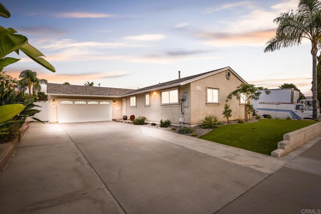 Welcome to 6767 Cowles Mountain Blvd, a stunningly upgraded single-story home that blends comfort, style, and convenience in the heart of San Carlos. Offering 4 bedrooms, 2 bathrooms, and 1,404 sq. ft. of living space, this home sits on a generous 6,300 sq. ft. lot perfect for enjoying indoor-outdoor living. Step inside to find a bright and open layout with tile and laminate flooring in the main areas, cozy carpet in the bedrooms with AC and a whole house fan to help keep temperatures down. The beautifully updated kitchen features abundant storage and modern finishes, making it a perfect space for both everyday cooking and entertaining. The dining room is light and bright, highlighted by a charming bay window that creates an inviting atmosphere. Outside, the spacious backyard is ideal for relaxing, gardening, or hosting gatherings with friends and family. No HOA or Mello Roos help keep your costs down and the 2 car garage and long driveway provides you with extra storage for your cars, toys or favorite belongings. With its stylish upgrades, single-level design, and desirable location, this move-in ready home offers the best of San Diego living.